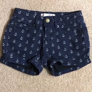 Navy blue regular waist shorts.